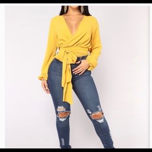 a mustard blouse